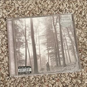 Folklore “In The Trees” (Explicit Version) CD with hype stickers